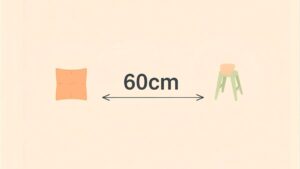 60cmの長さを、枕とスツールを使ってわかりやすく表したシンプルなイラスト